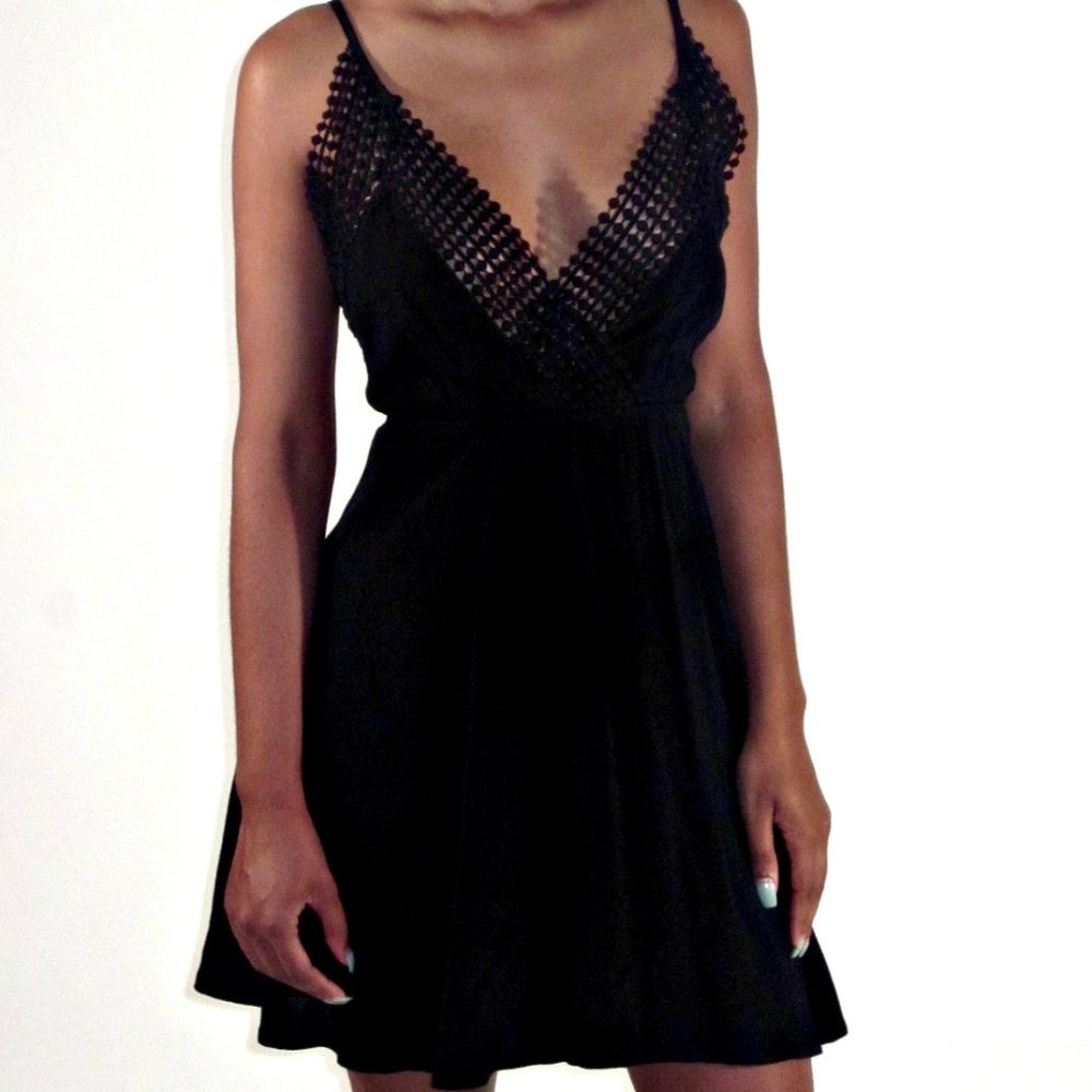 Backless skater dress with spaghetti straps